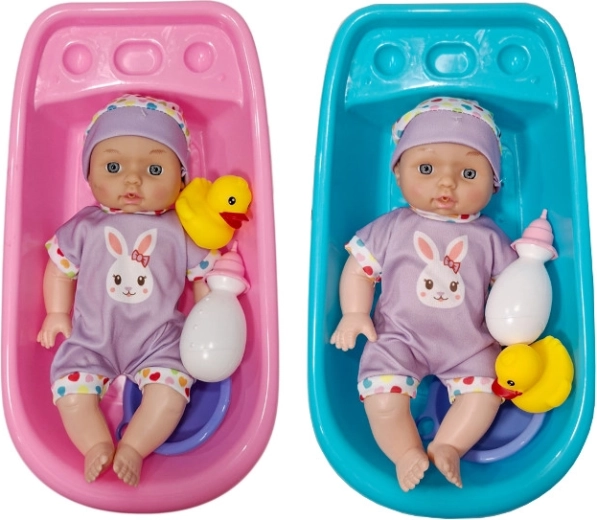 Poupon bébé qui fait pipi avec baignoire et accessoires