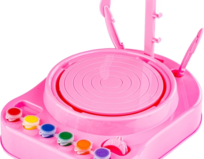 Tour de potier rose avec plateforme rotative