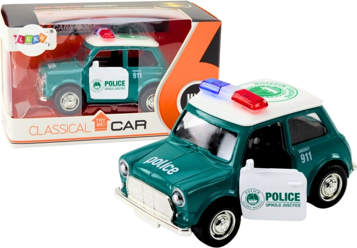Voiture de police classique 1:38 avec propulsion, lumières et sons verte