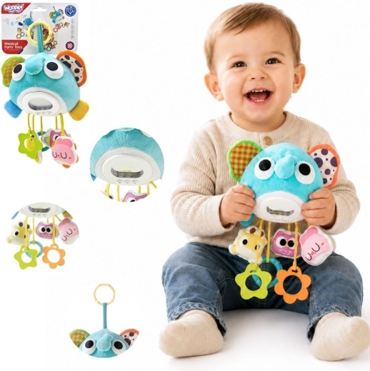 Éléphant musical en peluche Woopie avec accessoires suspendus et anneaux de dentition