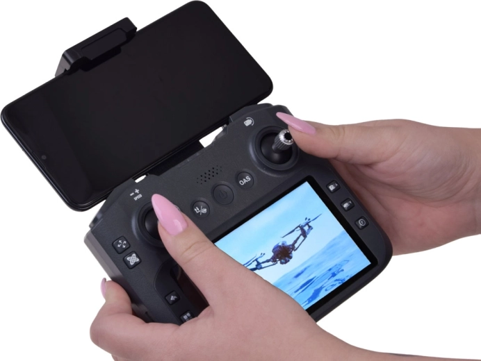 Télécommande avec écran intégré et support pour téléphone