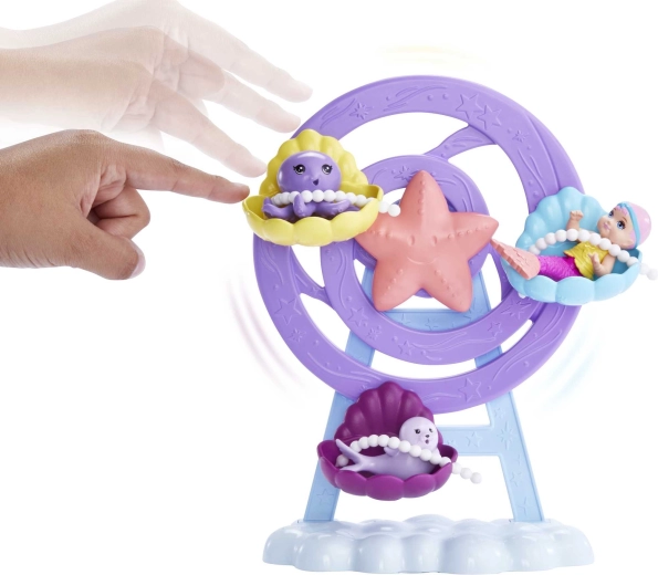 Carrousel tournant avec sièges en forme de coquillage