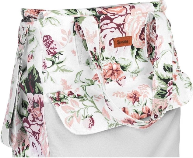 Poignées solides et possibilité de fixation à la poussette