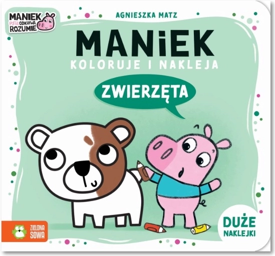 Maniek colorie et colle des animaux