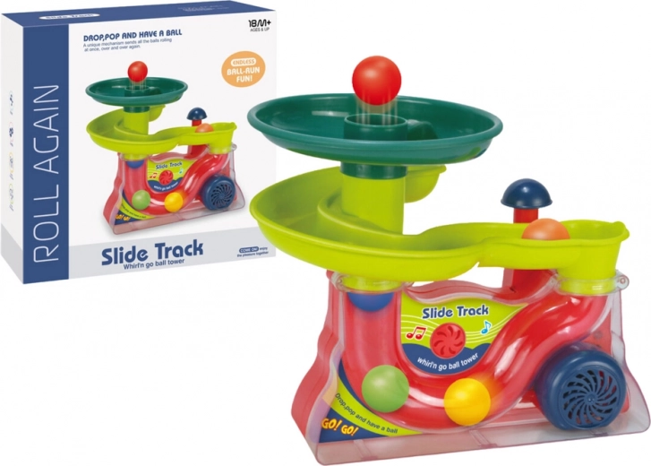 Fontaine interactive avec balles et sons, piste colorée en spirale