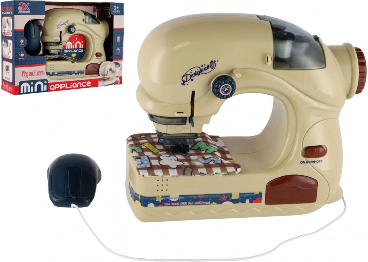 Machine à coudre pour enfants avec lumière à piles 20 cm