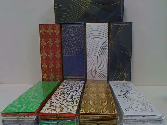Sac cadeau décoratif pour bouteille Avantgarde avec ornements dorés
