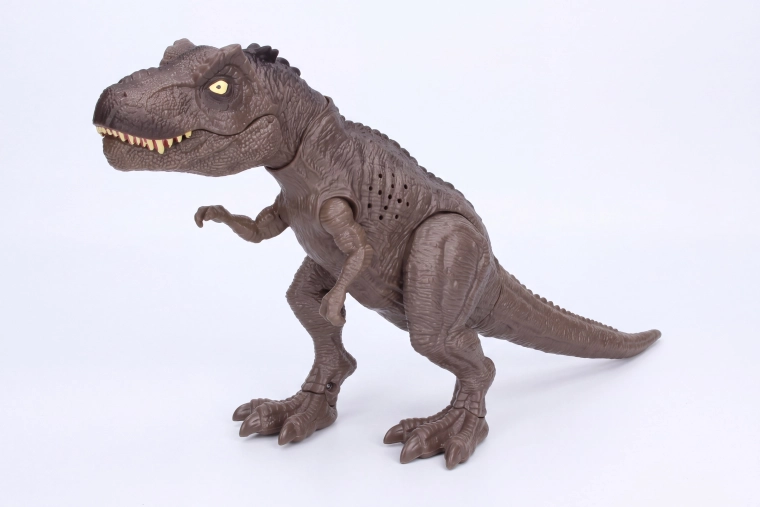 Dinosaure fumant avec effets lumineux et sonores 34 cm