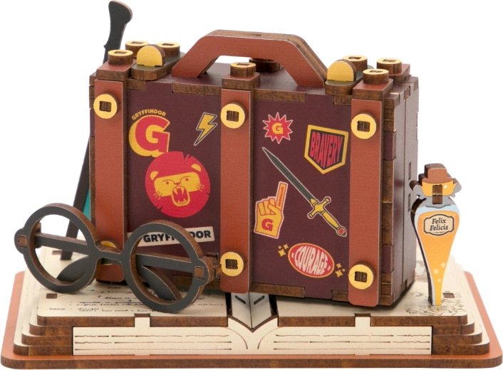 Socle avec valise dans le style Harry Potter