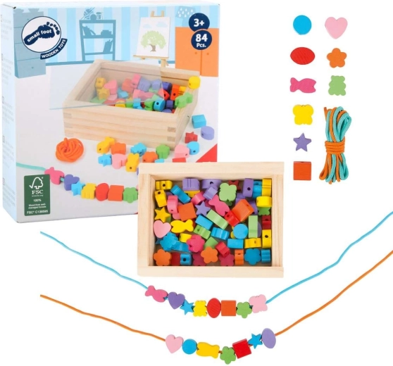 Small Foot perles en bois à enfiler de différentes formes dans une boîte