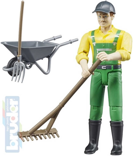 Figurine d'agriculteur BRUDER avec brouette et outils