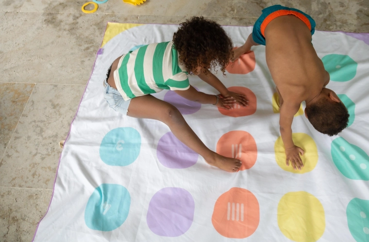 2-en-1 : jeu et serviette en un seul produit