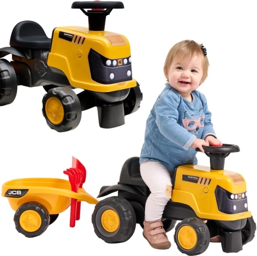 Porteur tracteur JCB Fastrac avec remorque, pelle et râteau