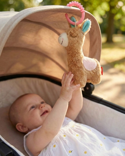 Boucle d’attache pour la poussette et le lit