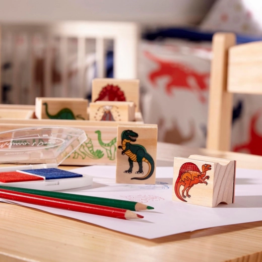 8 tampons en bois avec des dinosaures