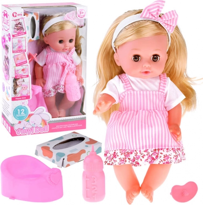 Poupée interactive avec de longs cheveux