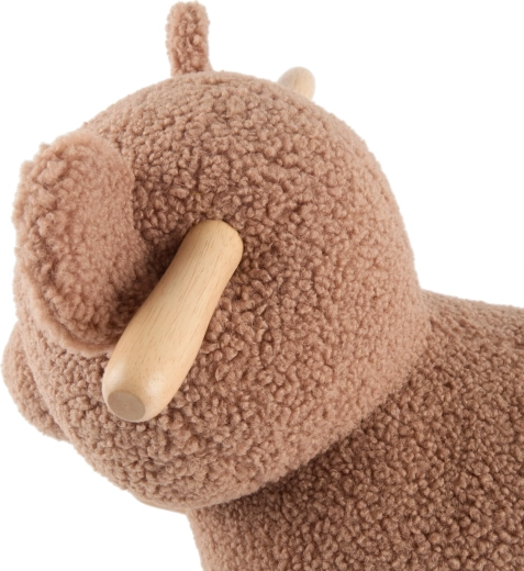 Surface bouclé toute douce qui invite aux câlins