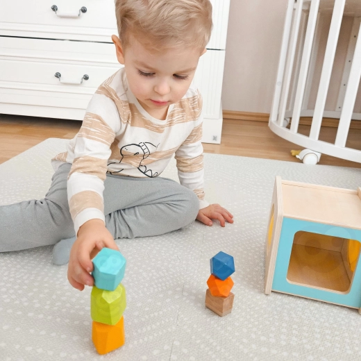 Construction de tours et plaisir d’équilibre