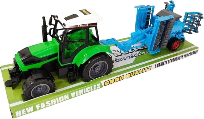 Tracteur pour enfants avec machine agricole additionnelle