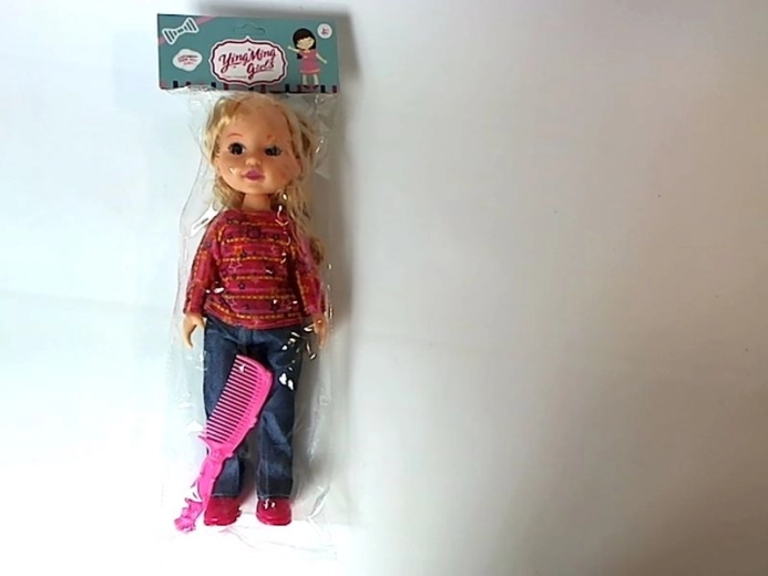 Poupée 33 cm avec peigne