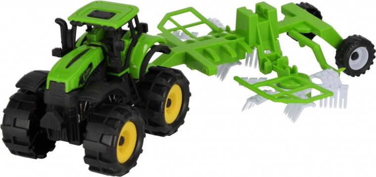 Tracteur avec outil agricole attaché