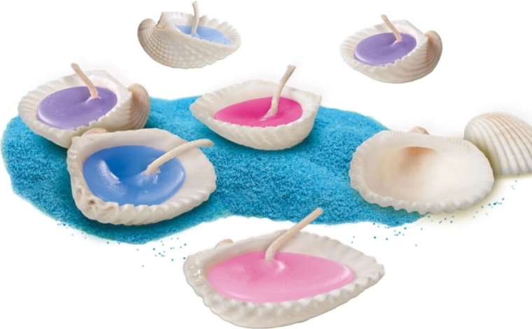Bougies dans de vrais coquillages