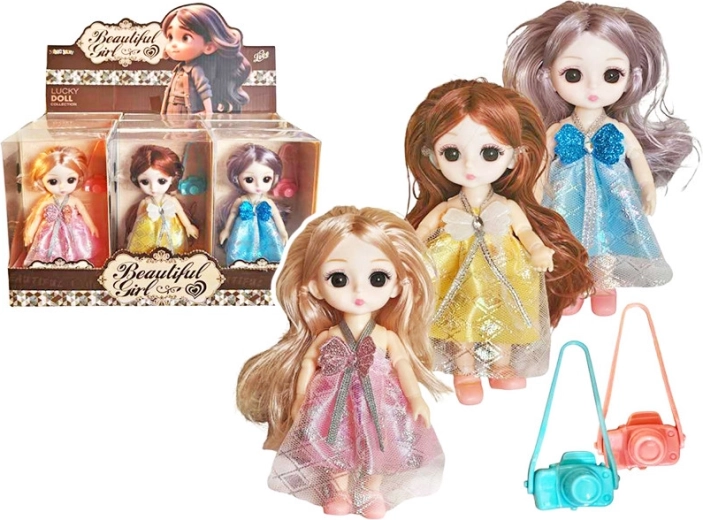 Poupée avec appareil photo 15 cm