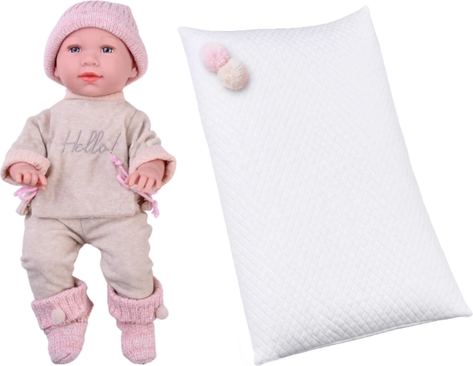 Tenue adorable et coussin pour l’endormissement