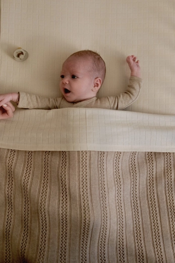 Idéale dans le lit et la poussette dès la naissance