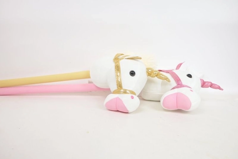 Licorne en peluche sur bâton avec son