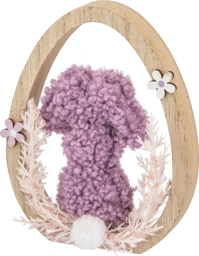 Doux motif de Pâques dans un œuf en bois