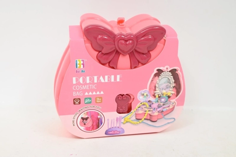 Coffret de beauté dans un sac à main rose