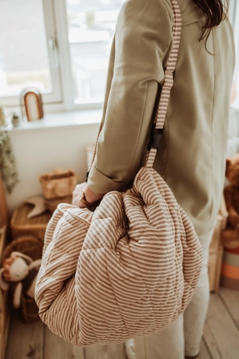 Transport confortable et fixation à la poussette