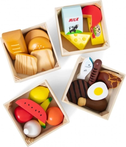Aliments en bois dans quatre boîtes