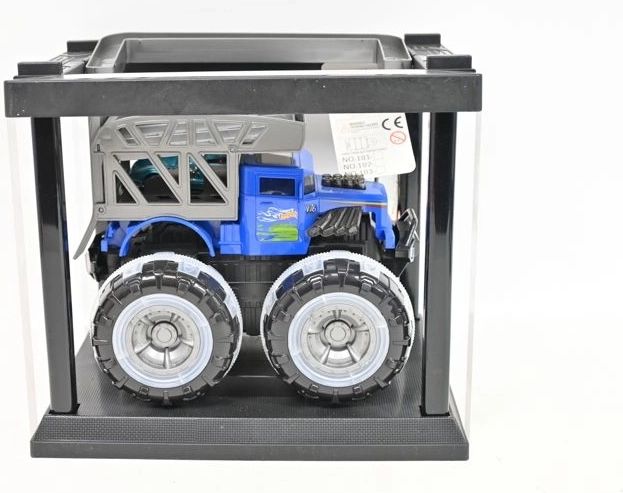 Monster truck en cage avec petite voiture