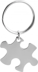 Pendentif en acier en forme de puzzle