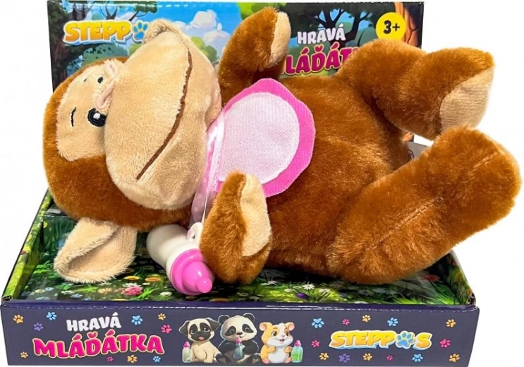 Petit singe interactif Steppos avec biberon