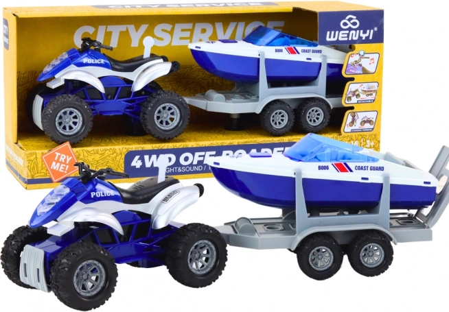 Quad de police avec remorque et bateau à moteur
