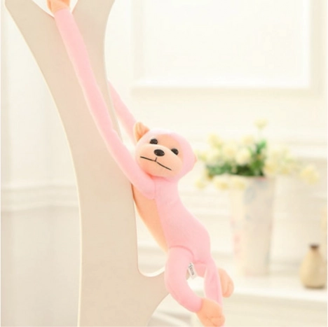 Singe en peluche avec son rose 80 cm