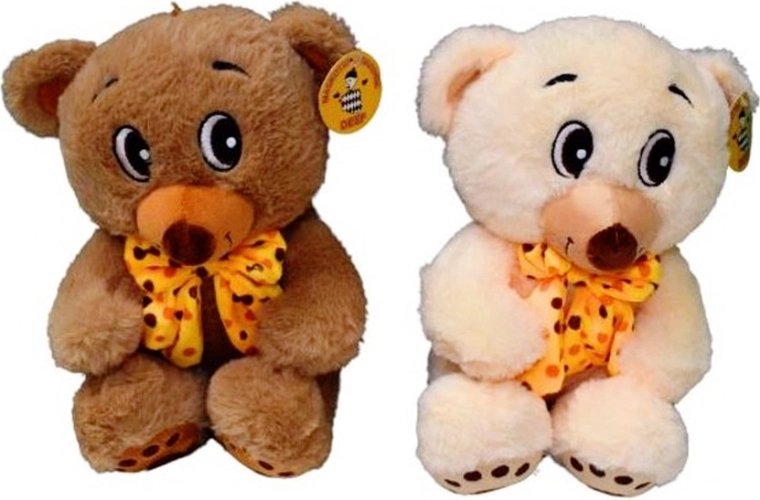 Ourson en peluche avec nœud à pois