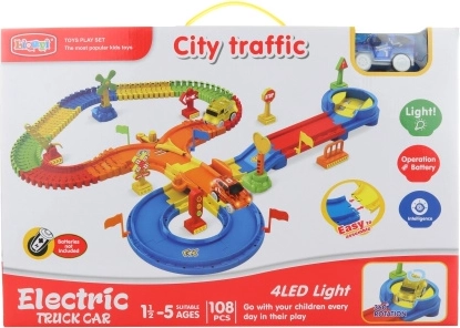 Piste lumineuse avec petite voiture à piles