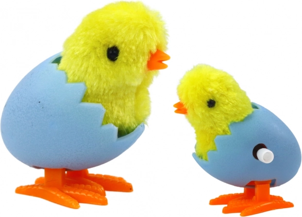 Poussin à Ressort dans Coquille Jaune