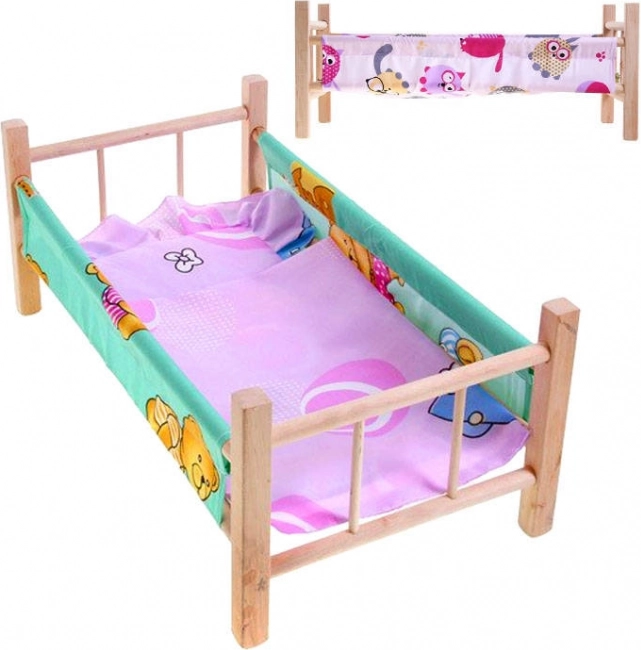 Lit de poupée en bois avec literie