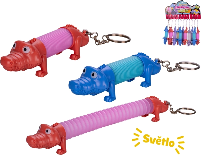 Porte-clés à remontoir crocodile avec lumière