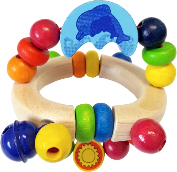 Hochet en bois avec dauphin