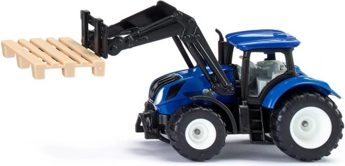 Tracteur New Holland avec fourches à palettes et palettes