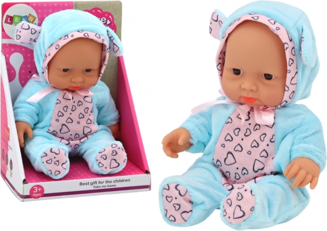 Petite poupée – bébé en tenue bleue avec bonnet à oreilles