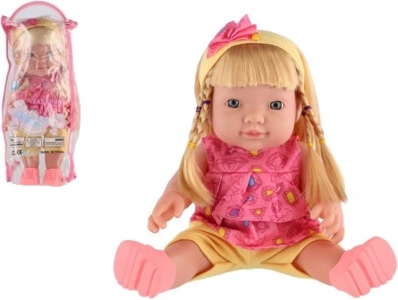 Poupée sonore 30 cm dans une pochette plastique