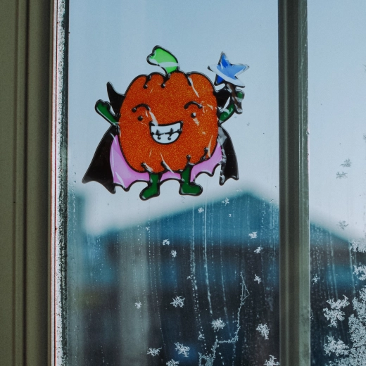 Décoration de fenêtre d’Halloween scintillante en forme de citrouille colorée