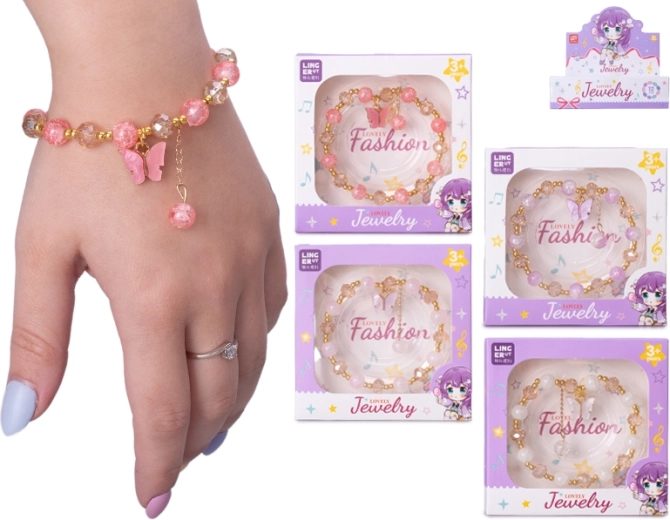 Bracelet pour enfant avec médaillon papillon dans une boîte cadeau